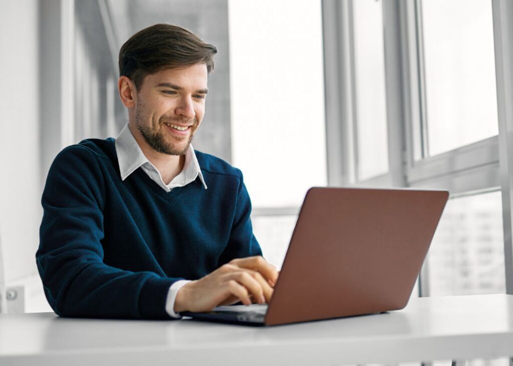 NGO Training Centre Online Disability NDIS Support Worker Training Courses and Learning Management System on Laptop